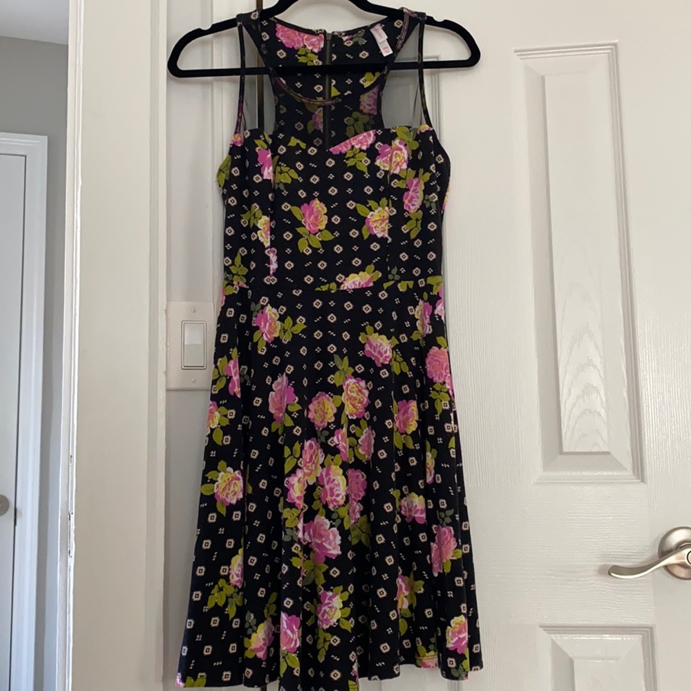Black sleeveless dress with pink flowers